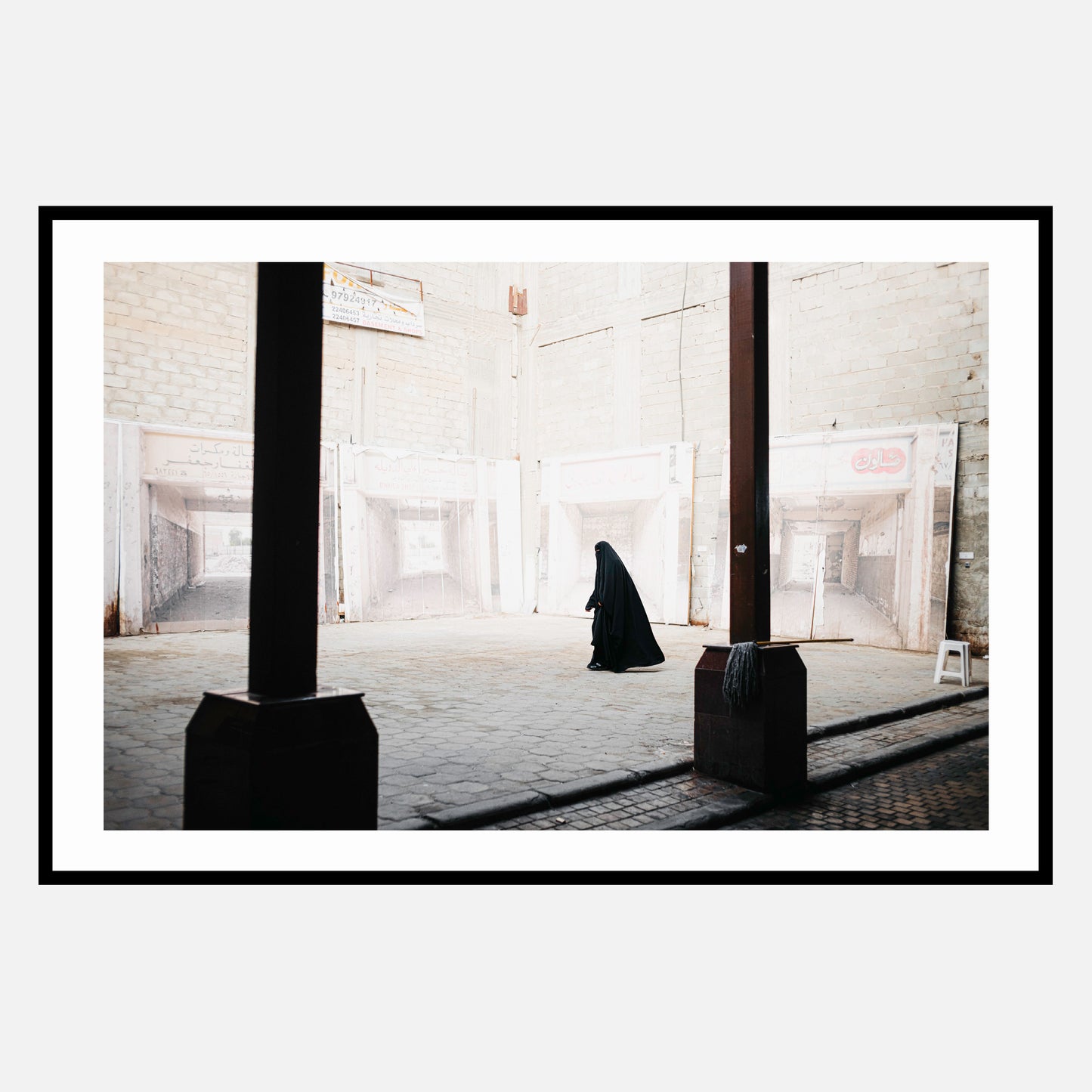 A Woman in the Souk | إمرأة في سوق المباركية